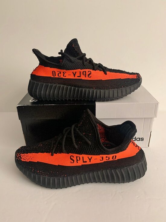 adidas men\'s Yeezy Boost 350 Black and Red Stripe Sneaker
